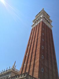 Low angle view of built structure against clear blue sky