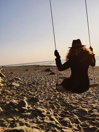 Silhouette of man standing on beach