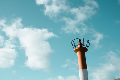 Low angle view of street light against sky