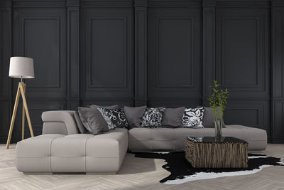 Classic black wall with sofa premium photo