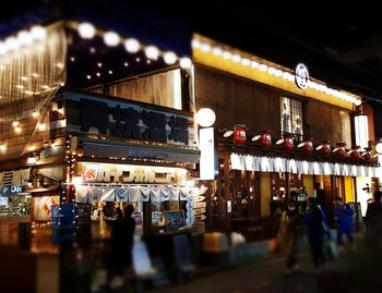 Illuminated market stall at night