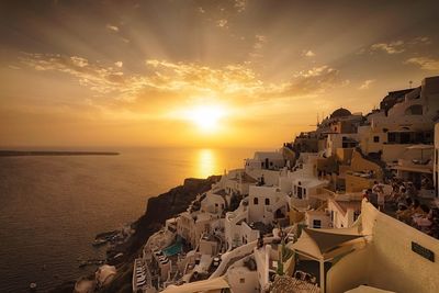 Panoramic view of sea against sky during sunset