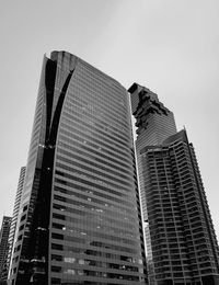 Low angle view of modern buildings against clear sky