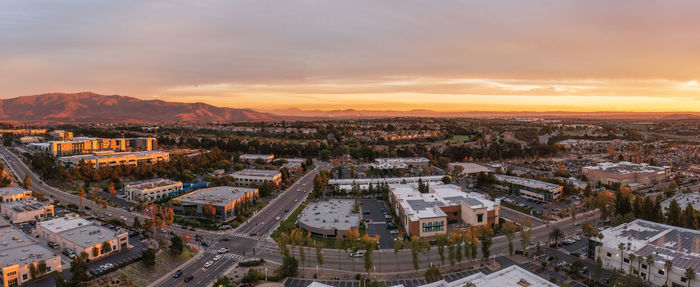 High angle view of townscape against sky during sunset