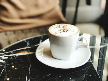 Close-up of coffee on table