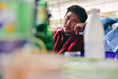 Young man looking away outdoors