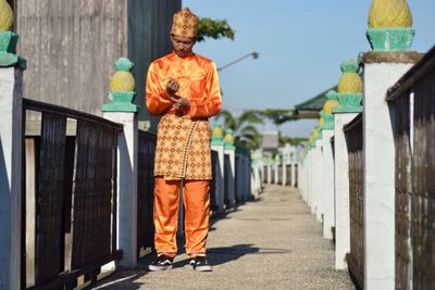 Full length of man standing on floor