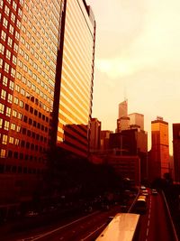 View of city street at sunset