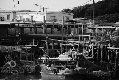 Boats moored at harbor