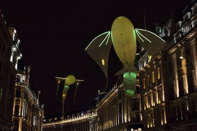 View of illuminated buildings at night