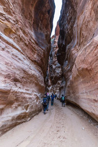 People on rock formation