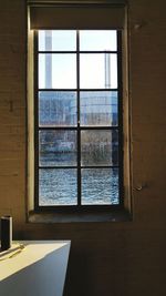Building by spree river seen from window