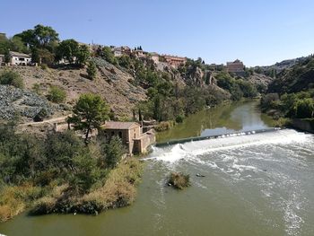 Scenic view of river against clear sky