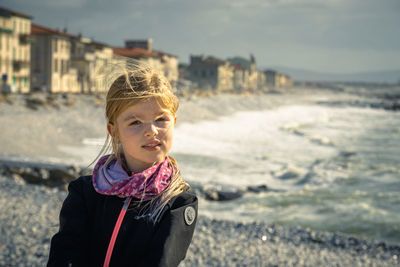 Portrait of girl standing on land