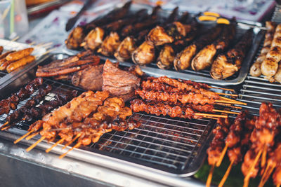 Close-up of meat on barbecue grill