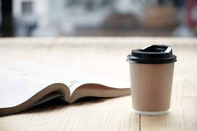 Close-up of coffee cup on table