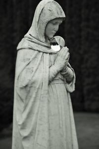 Side view of a young woman