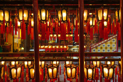 Illuminated lanterns hanging at night