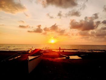 Scenic view of sea at sunset