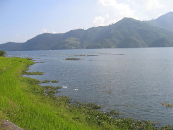 Scenic view of sea and mountains