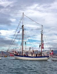 Boats moored at harbor