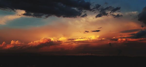 Scenic view of dramatic sky during sunset