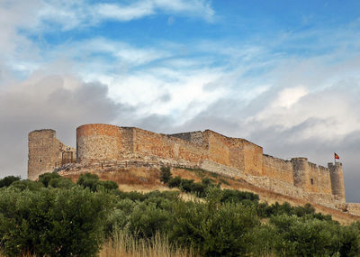 View of fort against cloudy sky