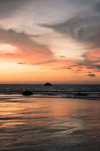 Scenic view of sea against sky during sunset