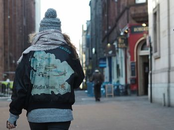 Rear view of man in snow
