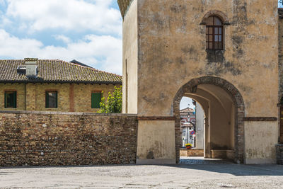 Entrance of historic building against sky