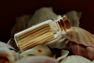 Close-up of small glass bottle