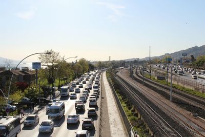 Railroad tracks and traffic in city