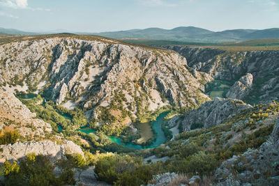 Panoramic view of landscape and mountains against sky