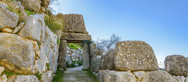 Old ruins of temple against clear sky