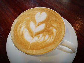 Close-up of cappuccino on table