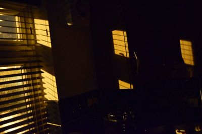 Low angle view of illuminated building at night