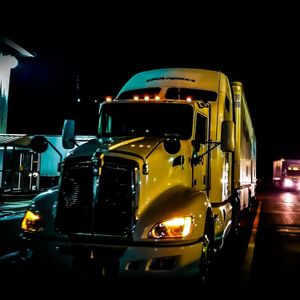 Cars on road at night