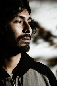 Portrait of young man looking away