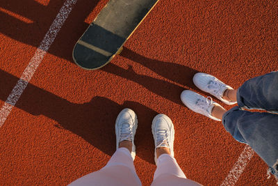 Low section of people standing on floor