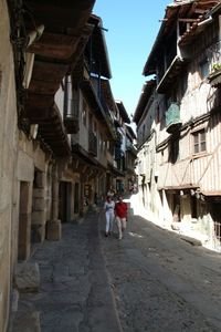 Narrow alley along buildings