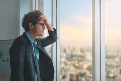 Man looking at window