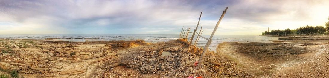 Panoramic view of beach against sky