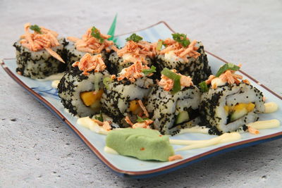 Close-up of sushi in plate on table