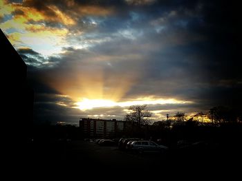 Road against cloudy sky at sunset