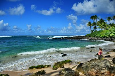 Scenic view of sea and tropical beach