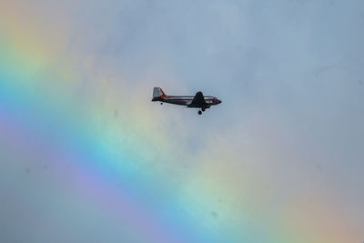 Low angle view of airshow against sky