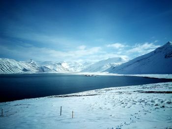 Scenic view of snowcapped mountains against sky