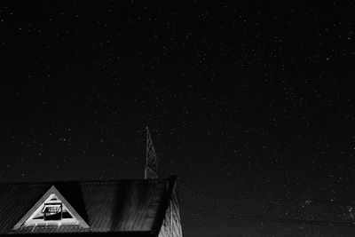 Low angle view of building against sky at night