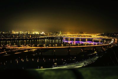 View of illuminated city at night