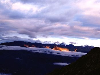 Scenic view of mountains against sky during winter